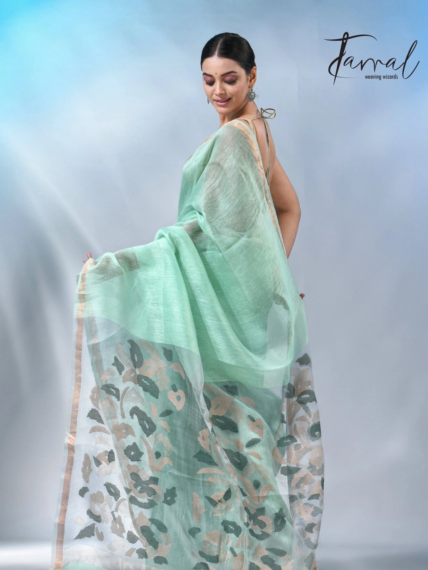 Mint green colour in the silk linen handwoven jamdani saree