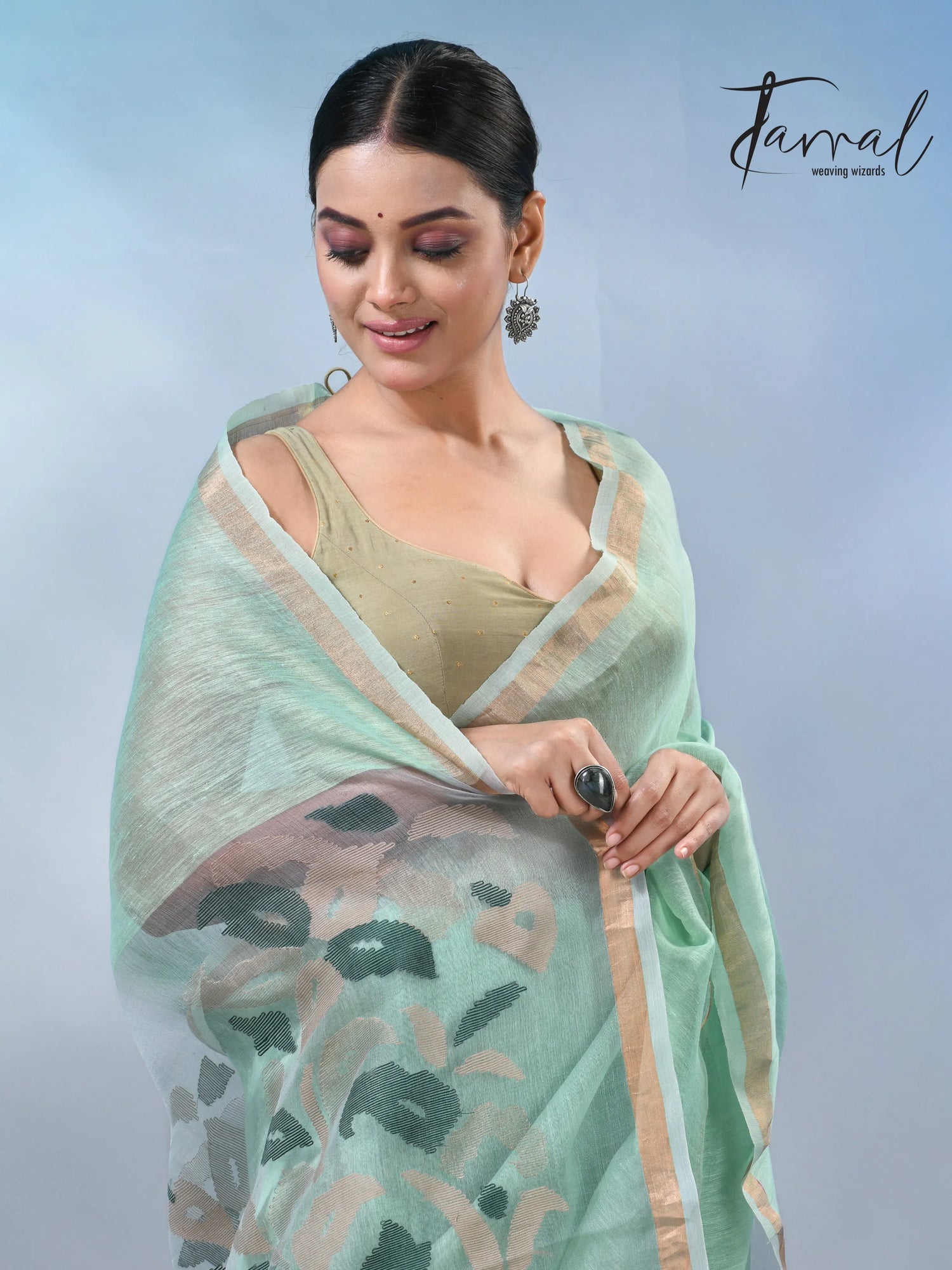 Mint green colour in the silk linen handwoven jamdani saree