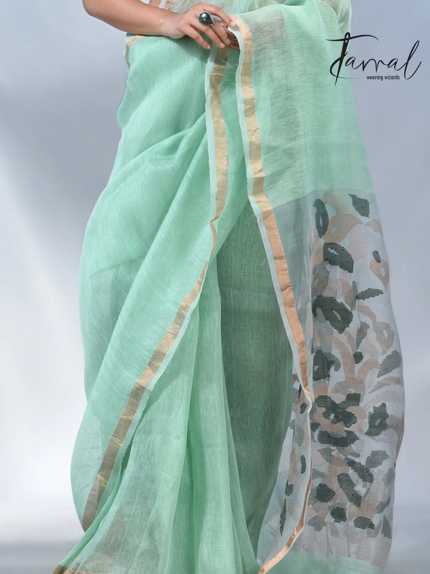 Mint green colour in the silk linen handwoven jamdani saree