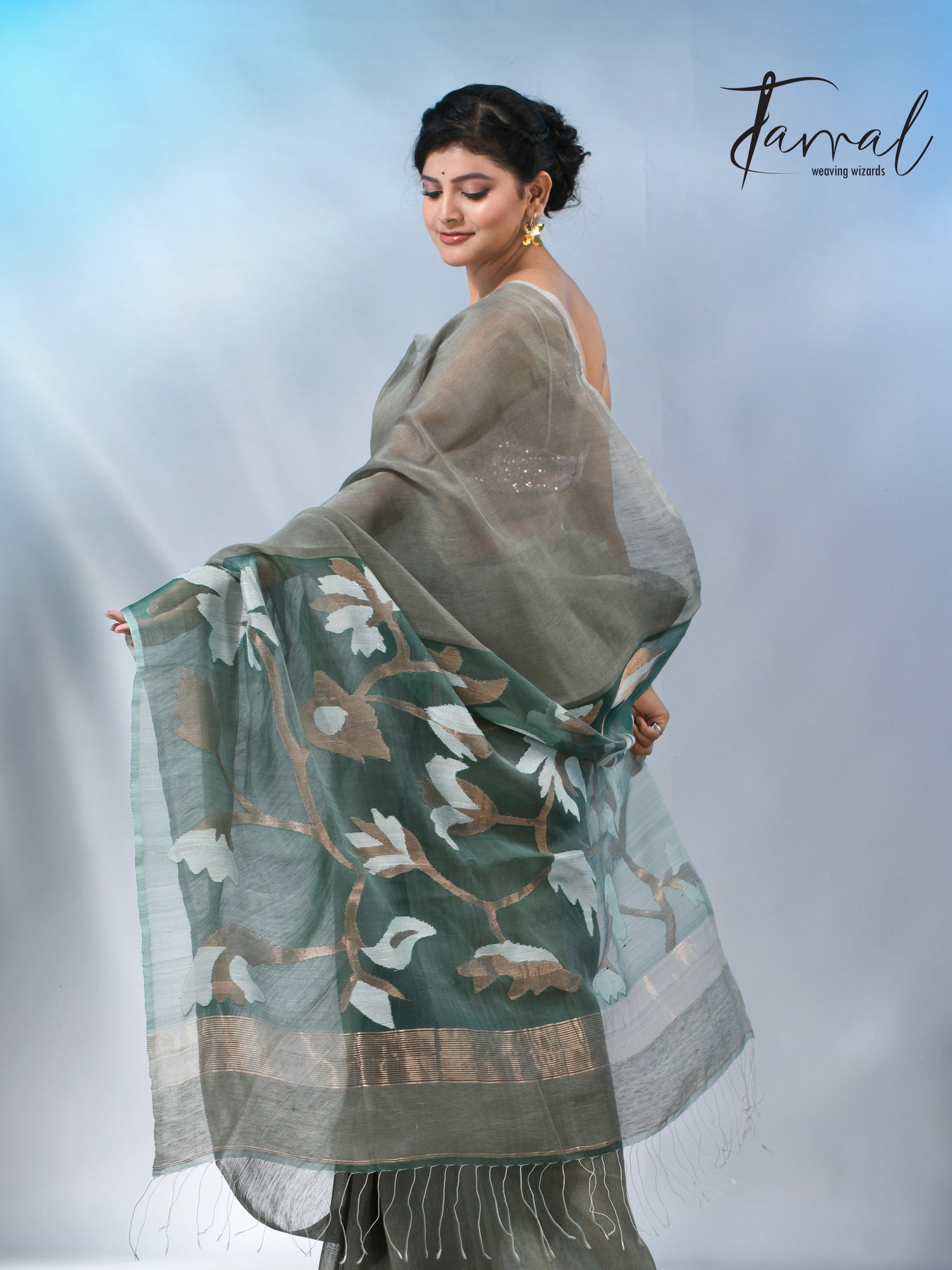 Moss green floral pallu silk linen handwoven jamdani saree