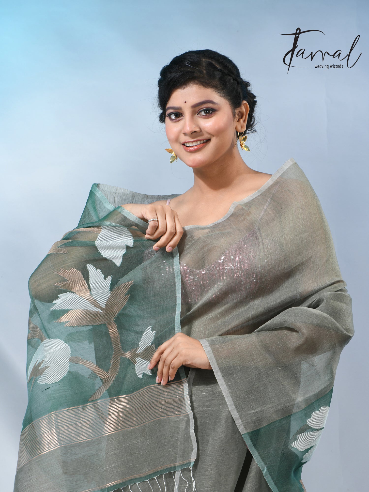 Moss green floral pallu silk linen handwoven jamdani saree