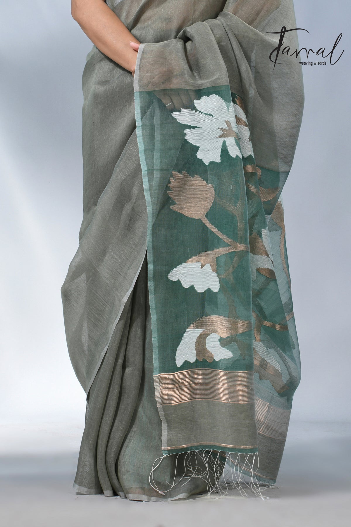 Moss green floral pallu silk linen handwoven jamdani saree