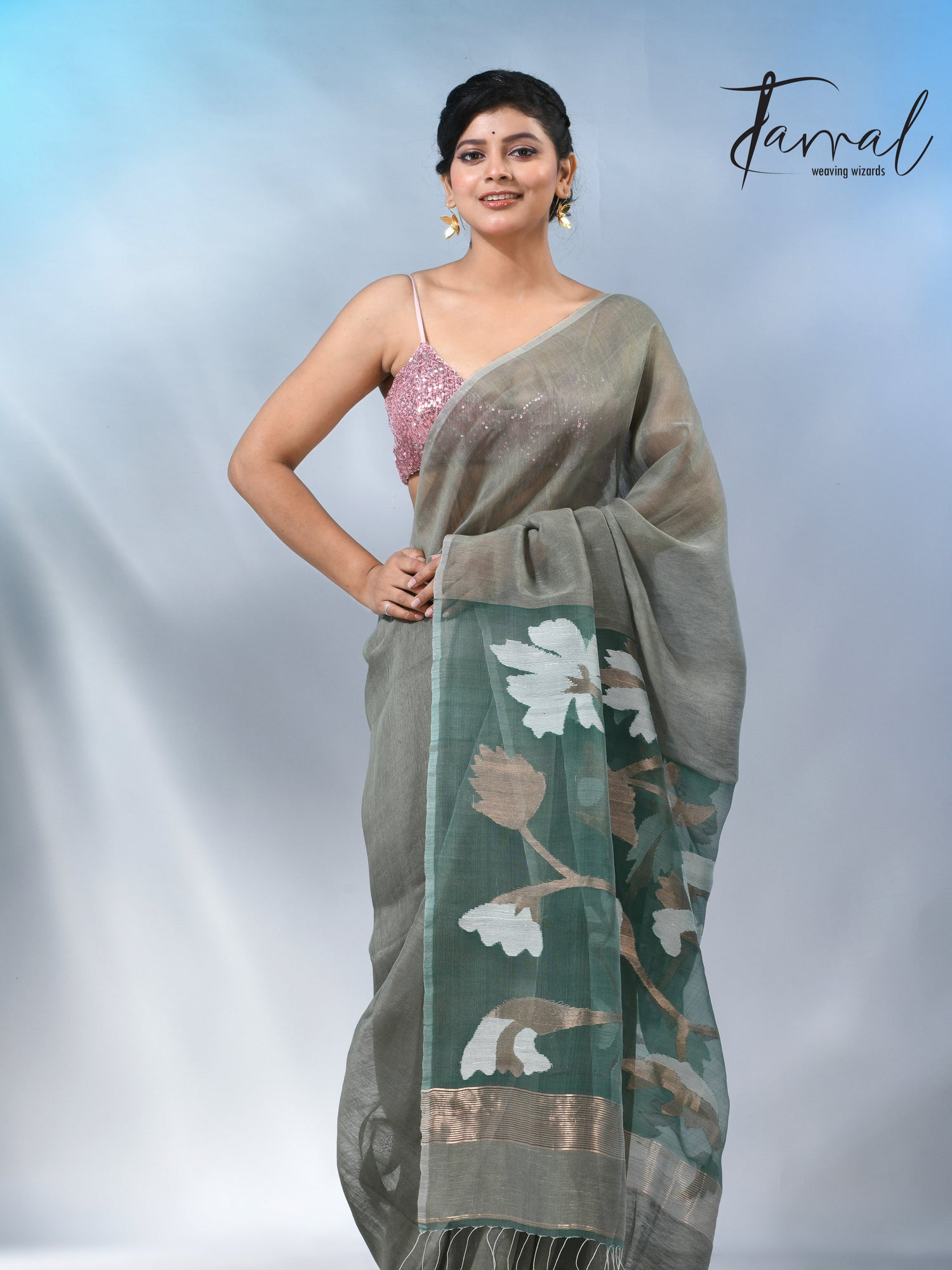 Moss green floral pallu silk linen handwoven jamdani saree