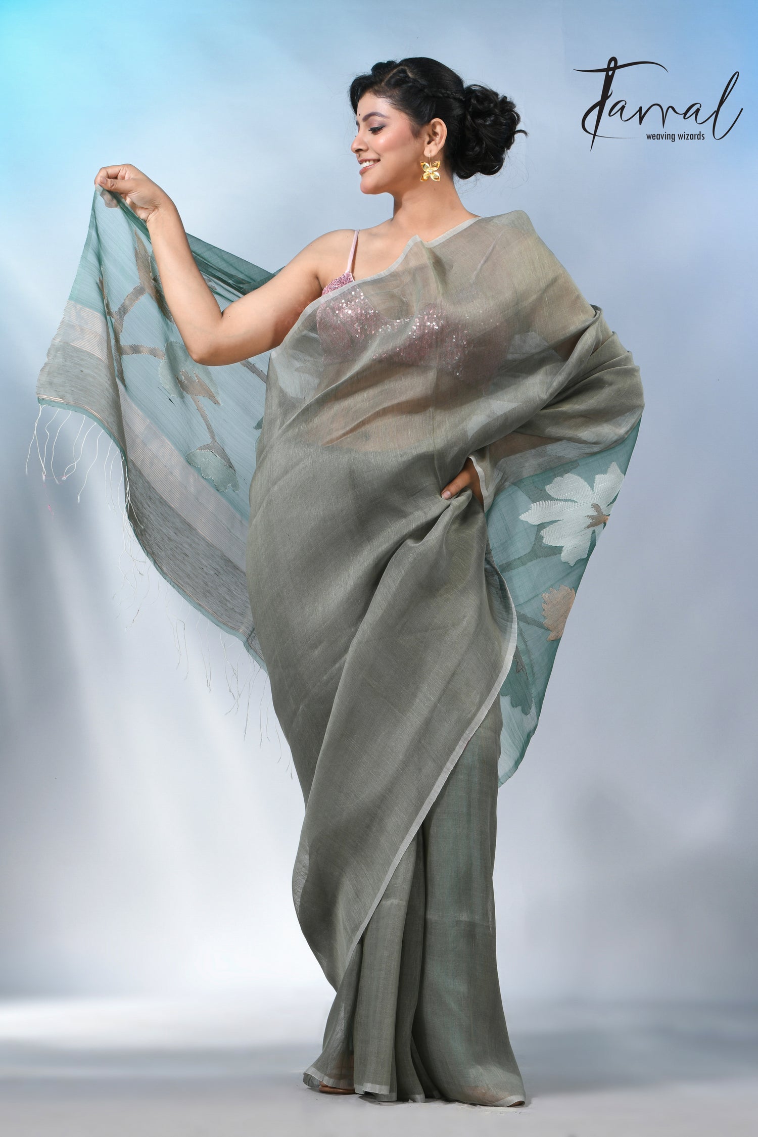 Moss green floral pallu silk linen handwoven jamdani saree