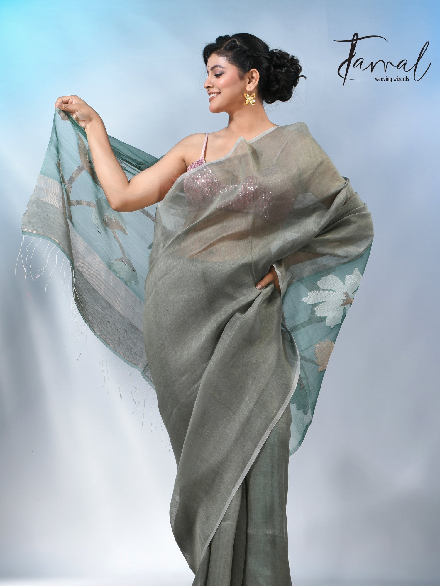 Moss green floral pallu silk linen handwoven jamdani saree