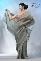 Moss green floral pallu silk linen handwoven jamdani saree