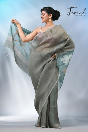 Moss green floral pallu silk linen handwoven jamdani saree