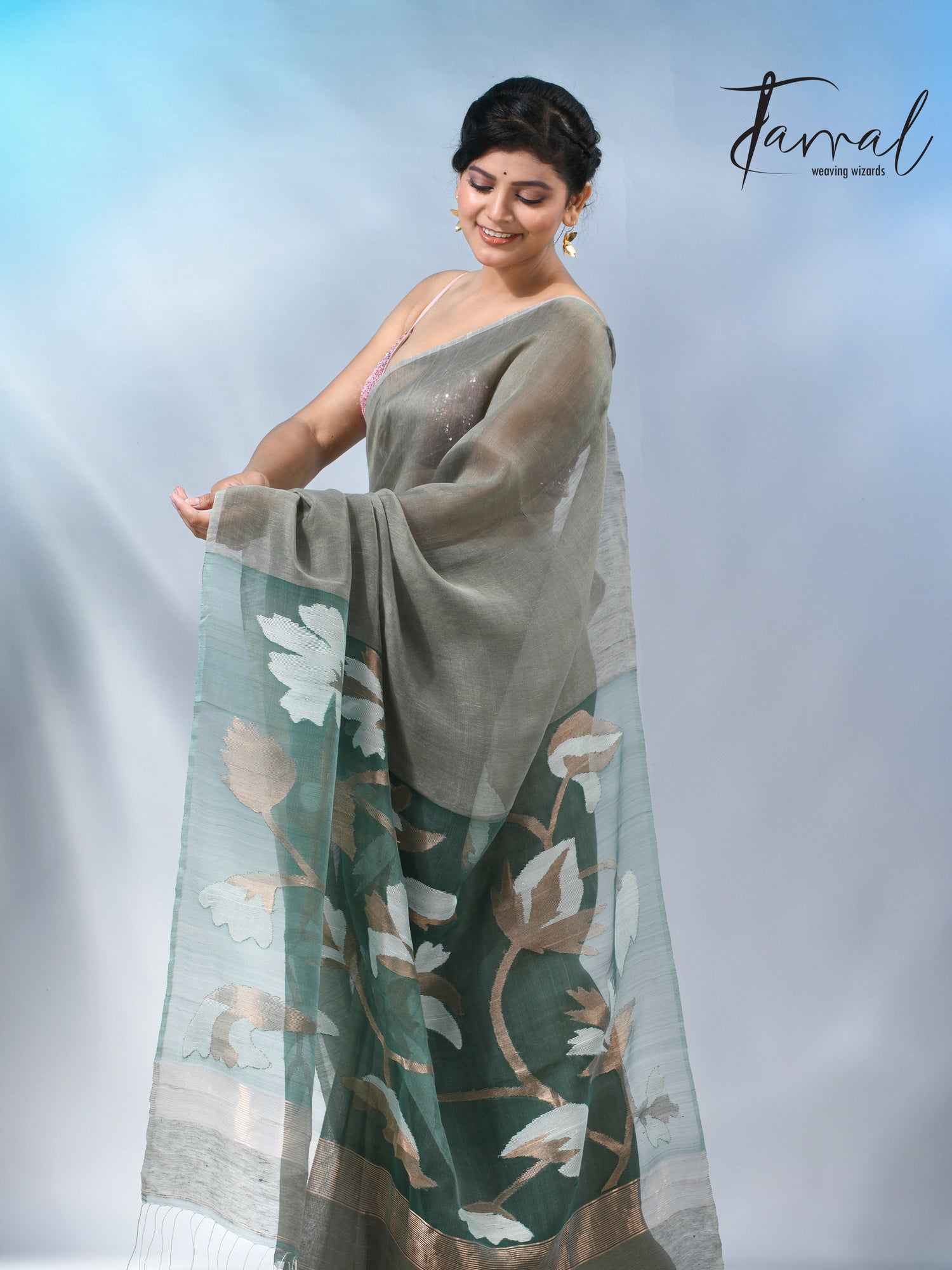 Moss green floral pallu silk linen handwoven jamdani saree