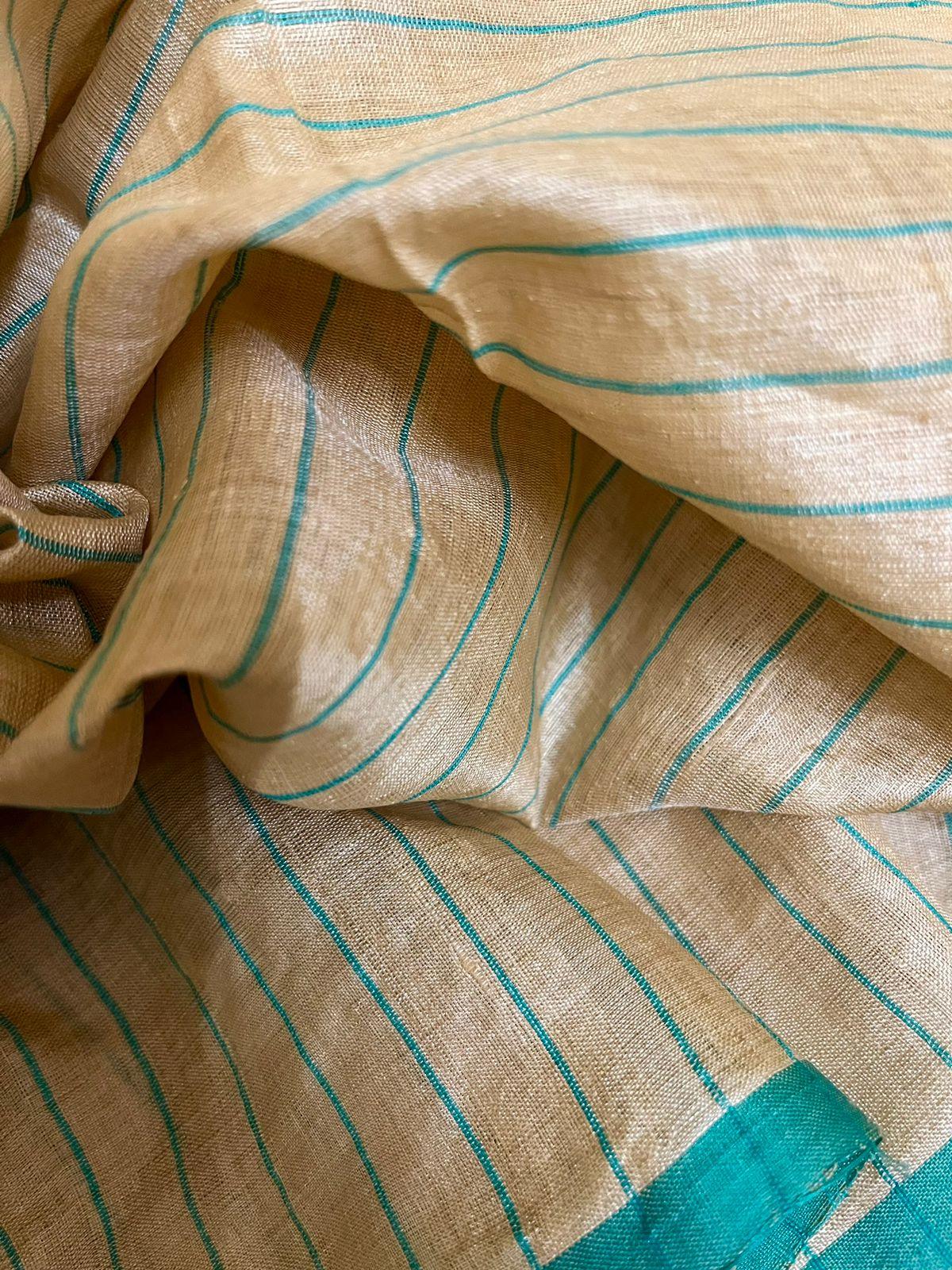 Muga with sea green floral border handwoven tussar silk saree - Tamal Boutique