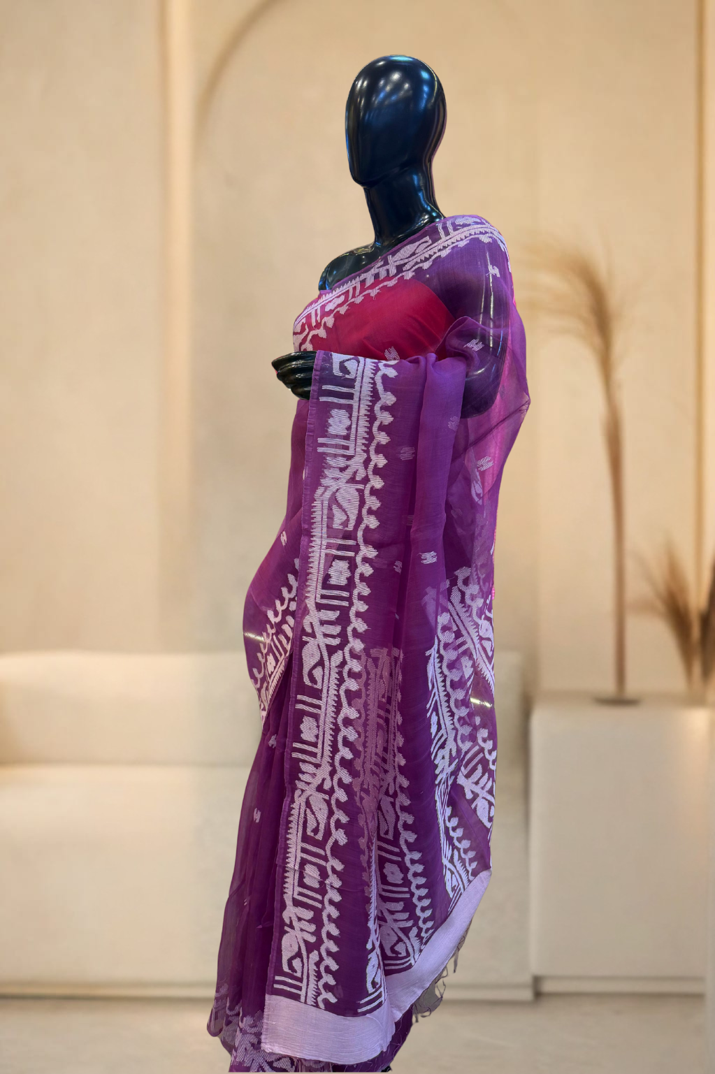 Purple saree with white patterns on a mannequin against a neutral background | Tamal Boutique ,City center 2, Kolkata