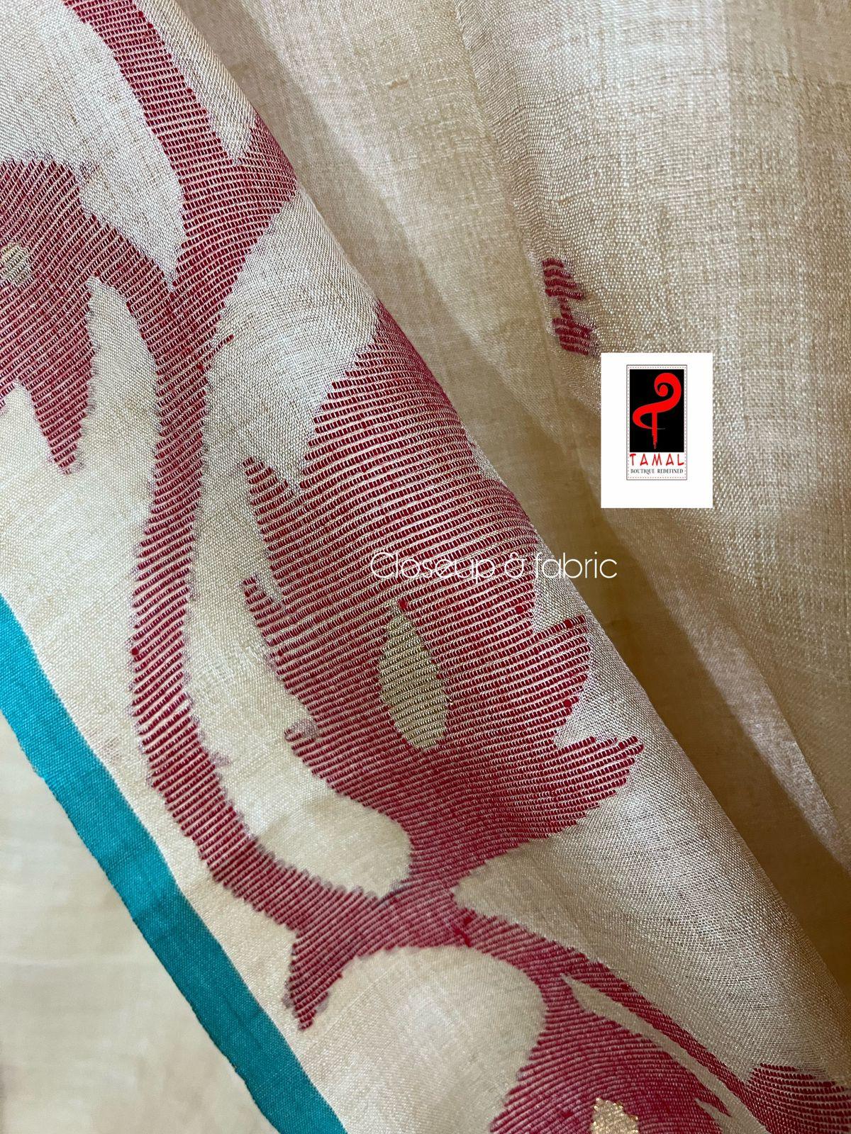 Natural tusser with firoza border alpona motifs handwoven jamdani saree - Tamal Boutique