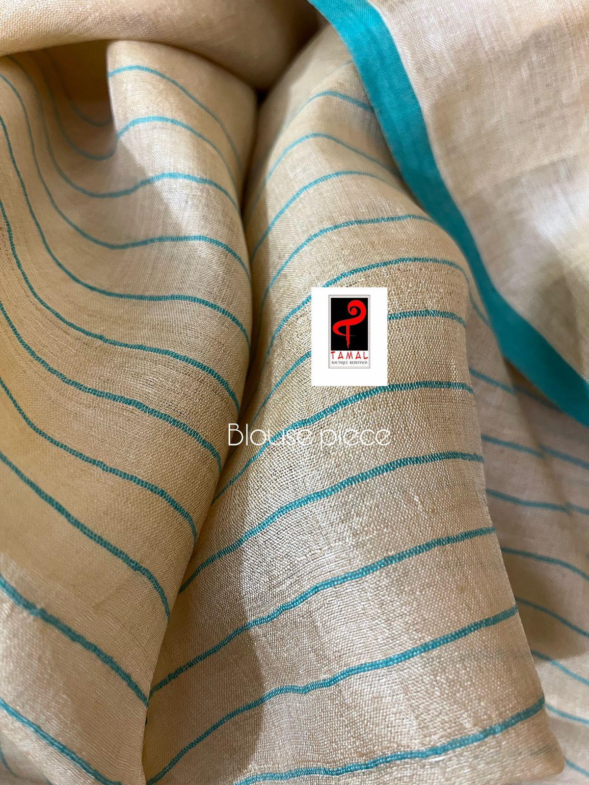 Natural tusser with firoza border alpona motifs handwoven jamdani saree - Tamal Boutique