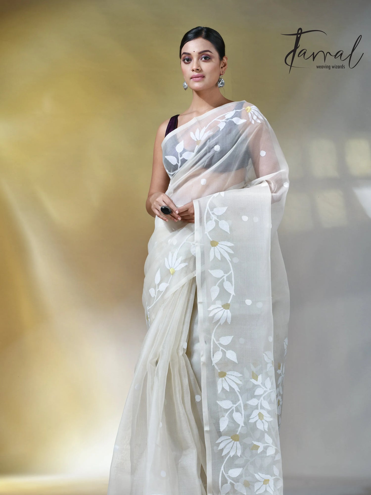 Off white self floral in handwoven muslin silk jamdani saree