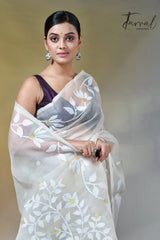 Off white self floral in handwoven muslin silk jamdani saree
