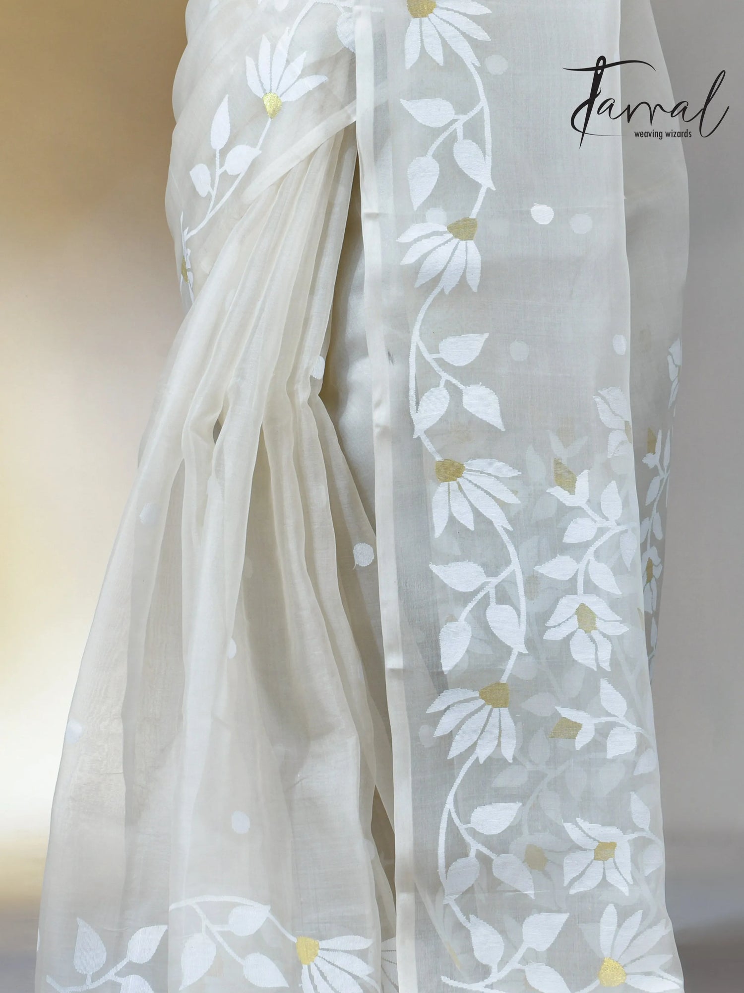 Off white self floral in handwoven muslin silk jamdani saree