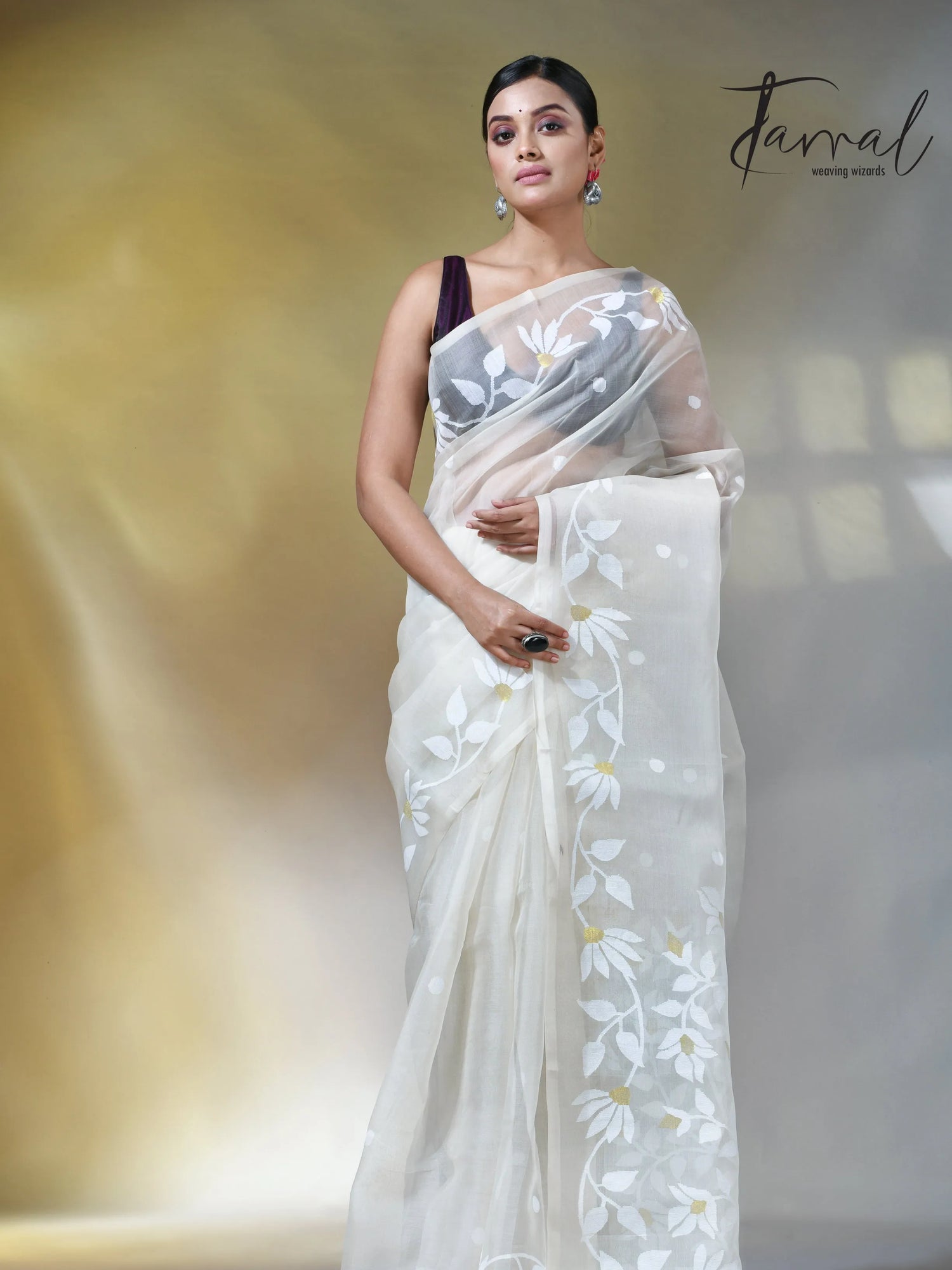 Off white self floral in handwoven muslin silk jamdani saree