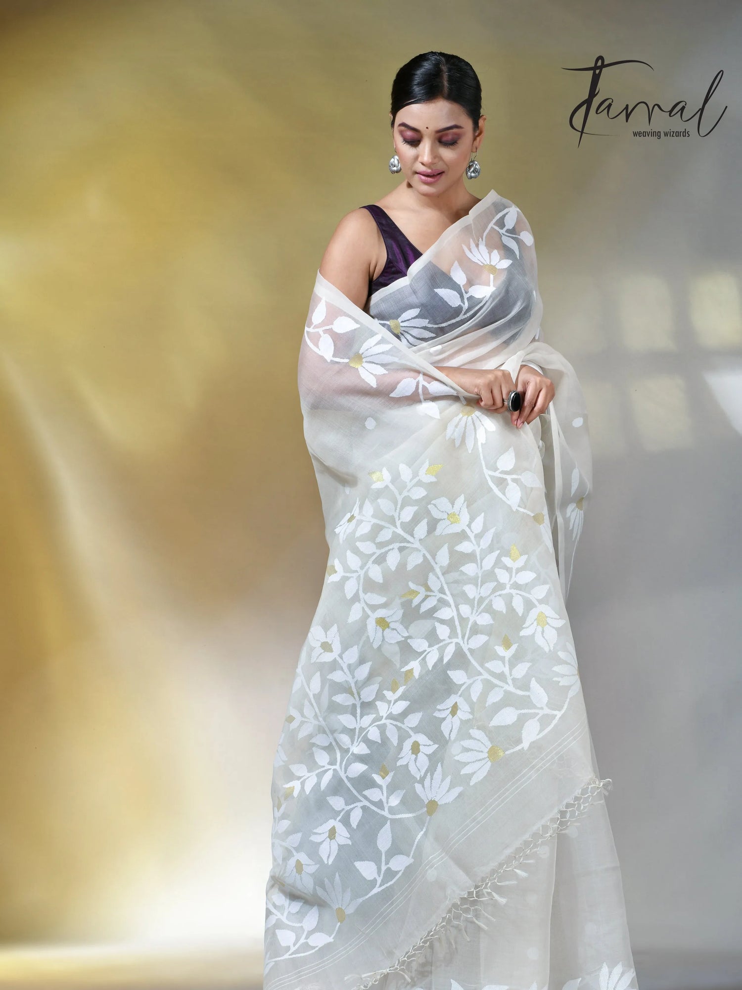 Off white self floral in handwoven muslin silk jamdani saree