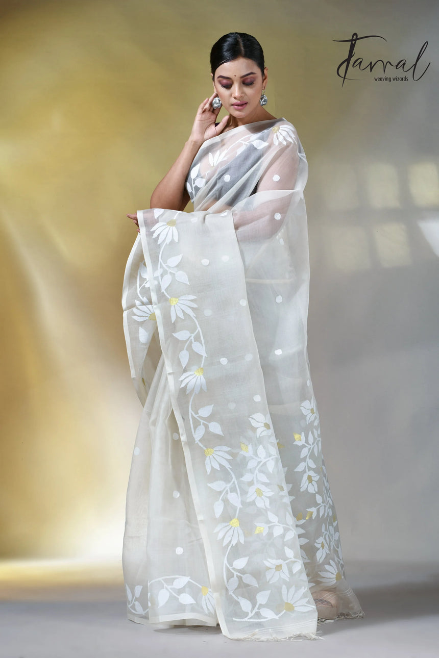 Off white self floral in handwoven muslin silk jamdani saree
