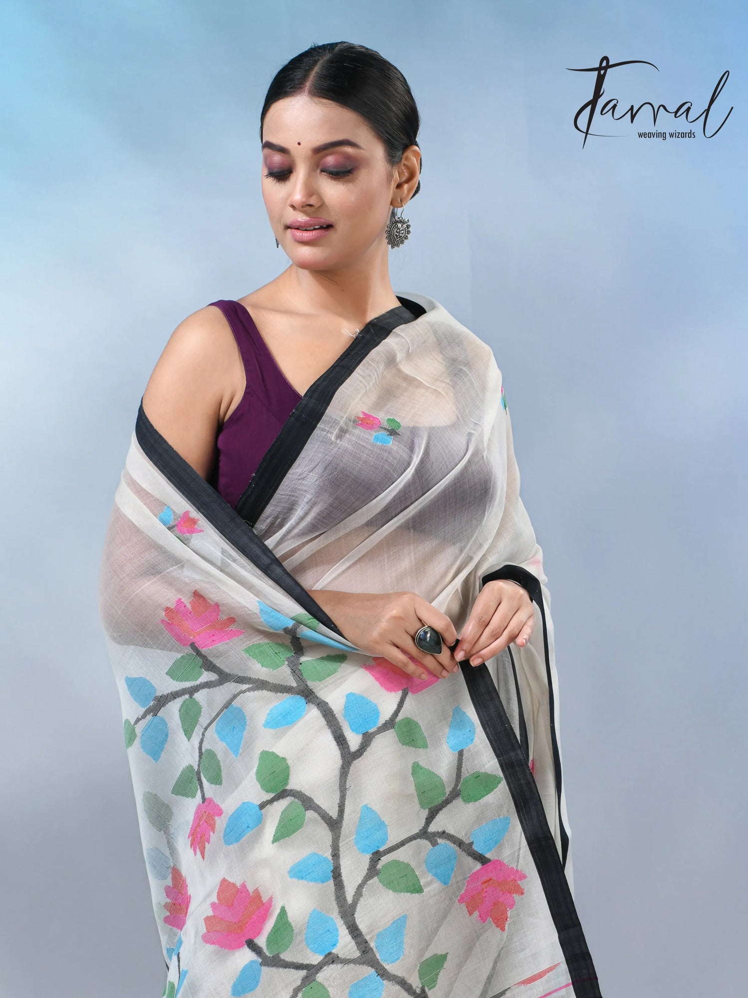 Off white with border muslin floral handwoven jamadani saree