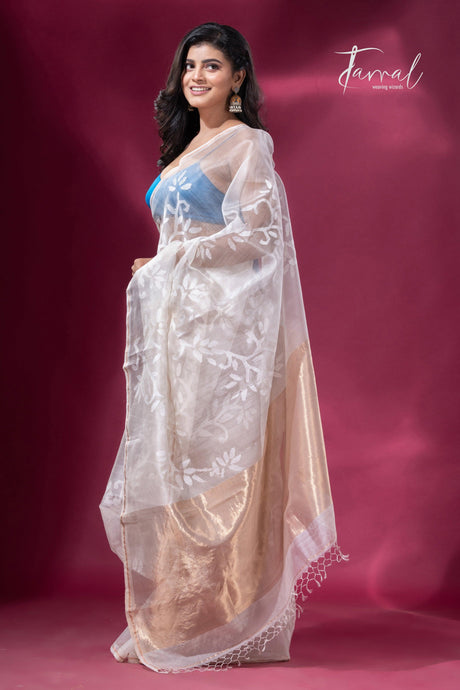Off white with floral handwoven jamdani in muslin silk saree left1
