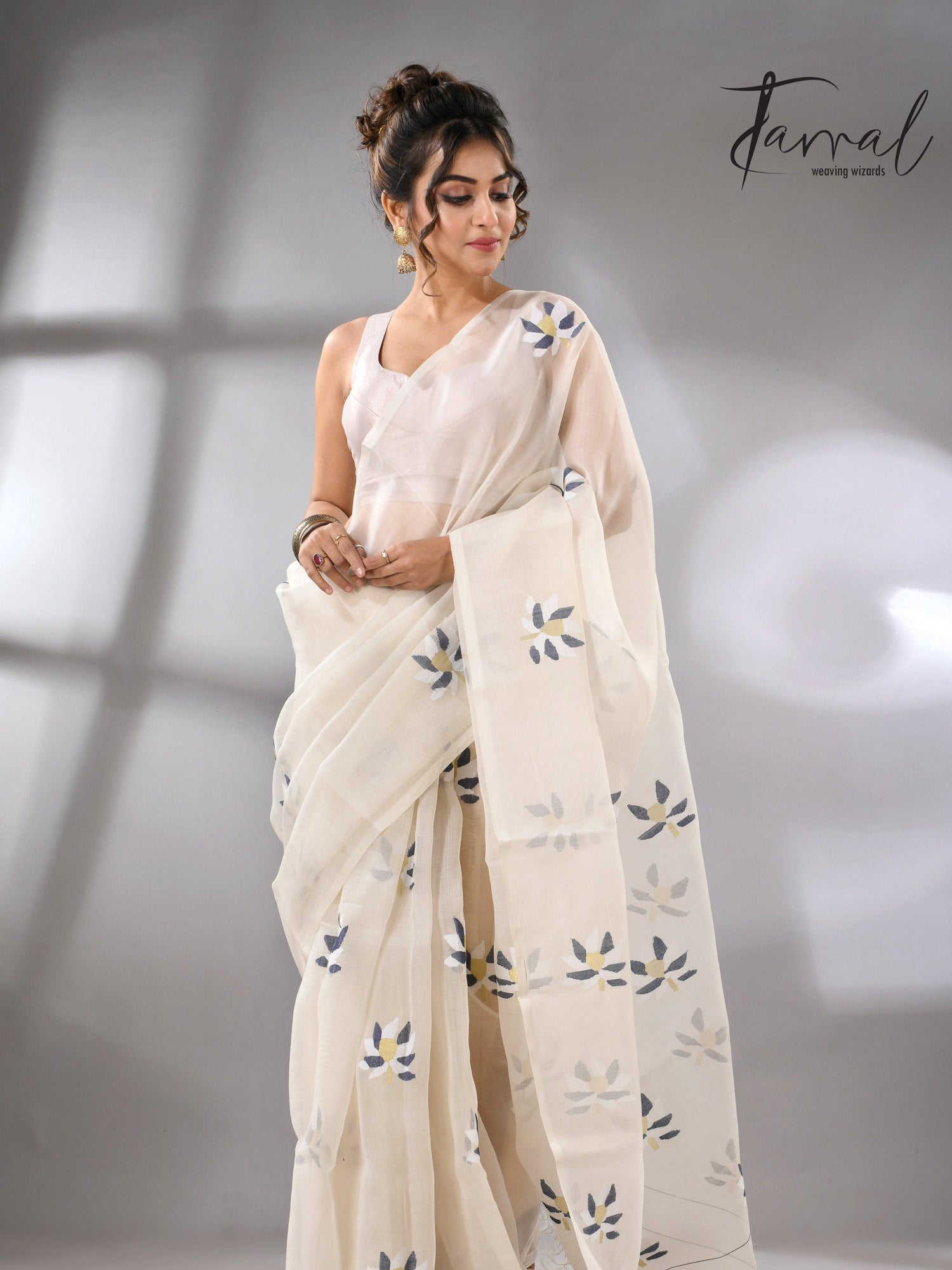 Offwhite Motifs Muslin Silk Jamdani Saree featuring Lotus
