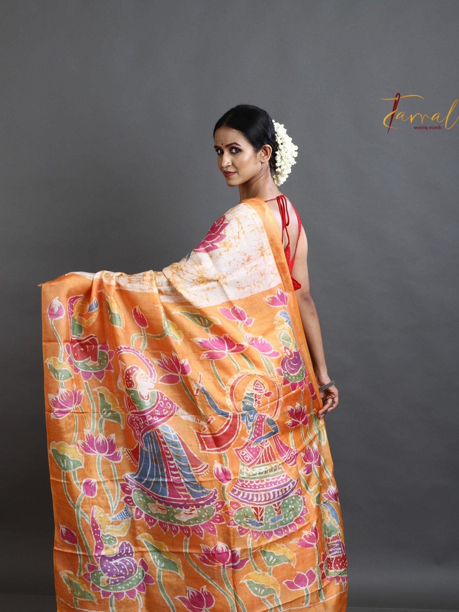 Offwhite with orange lotus motifs hand batik tussar silk saree - Tamal Boutique