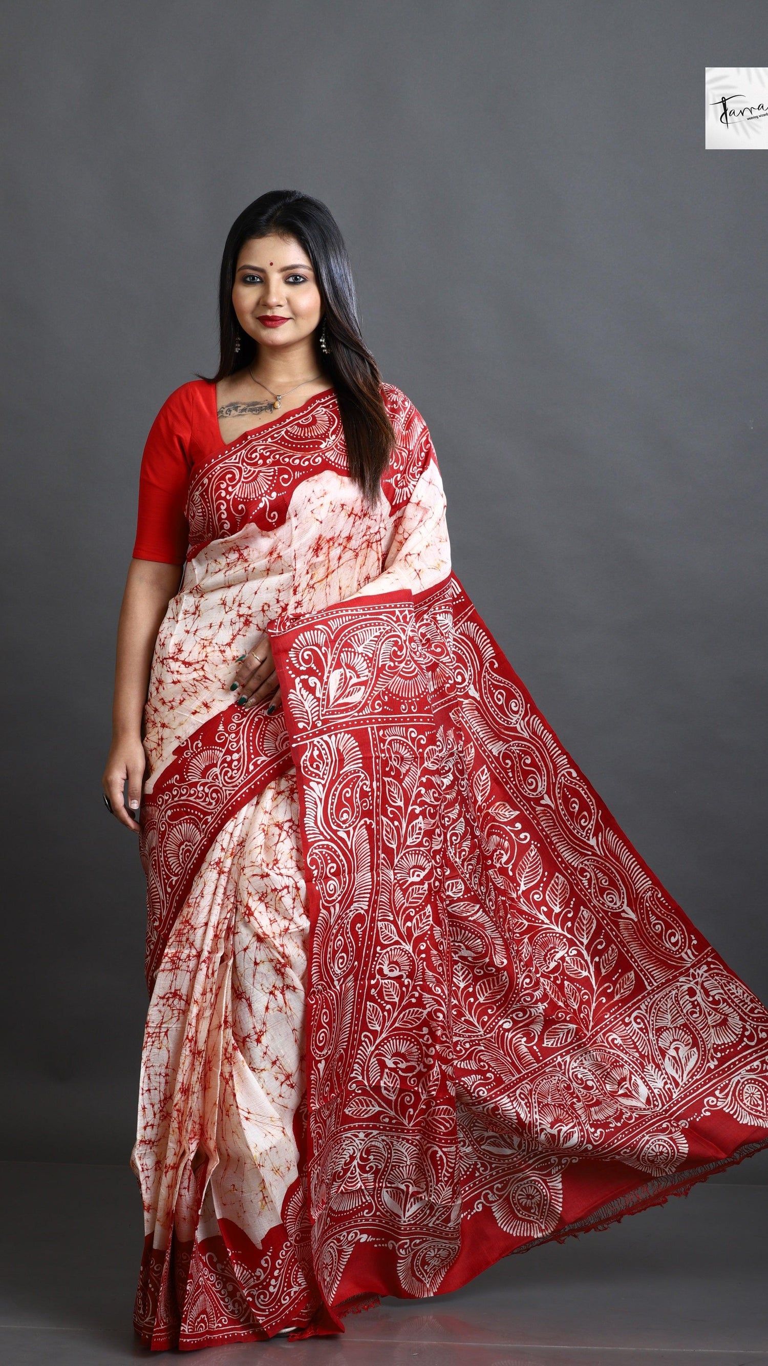 Offwhite red alpona motifs handcrafted pure batik silk saree