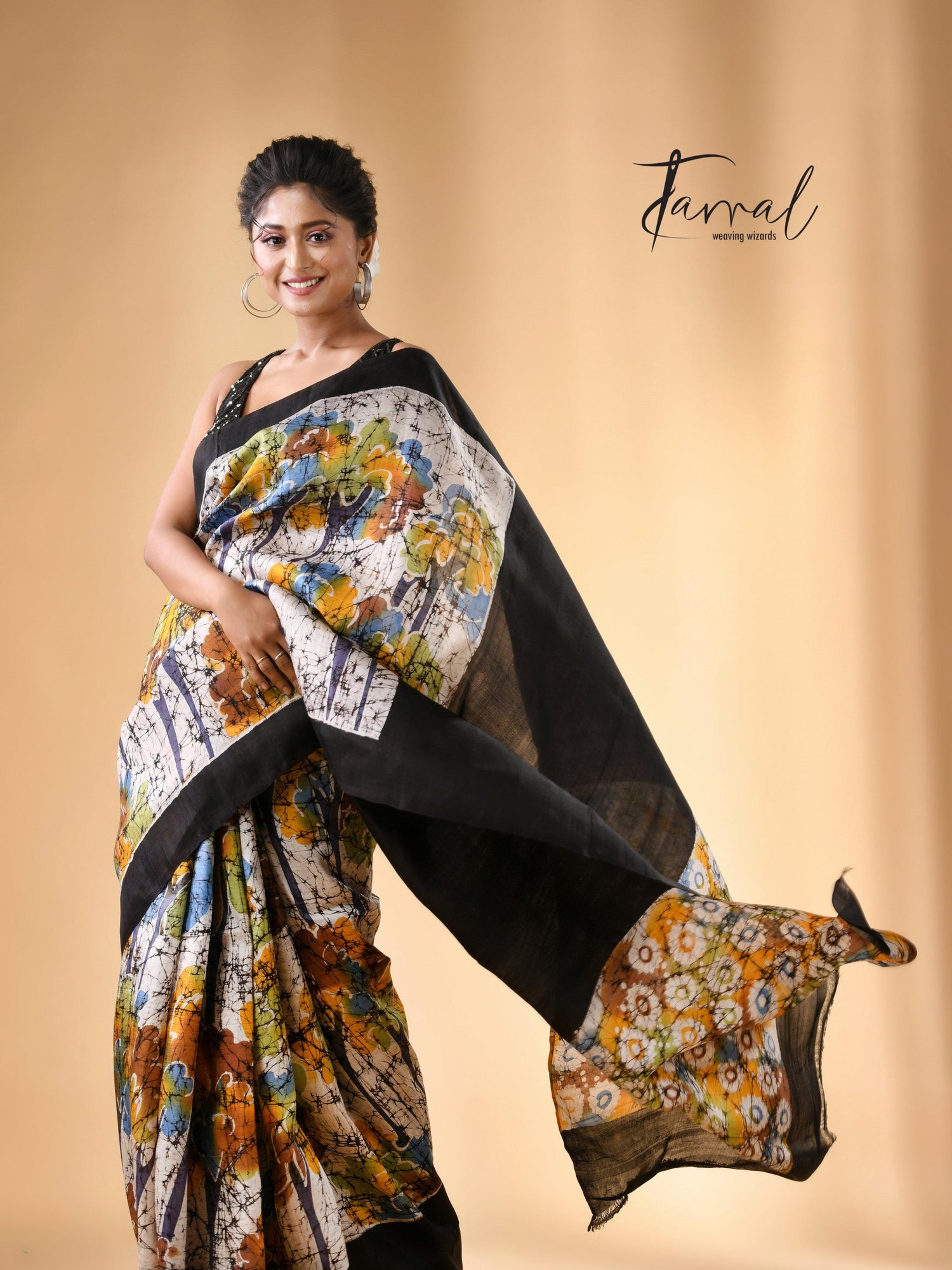 Offwhite with black border handcrafted batik pure silk saree
