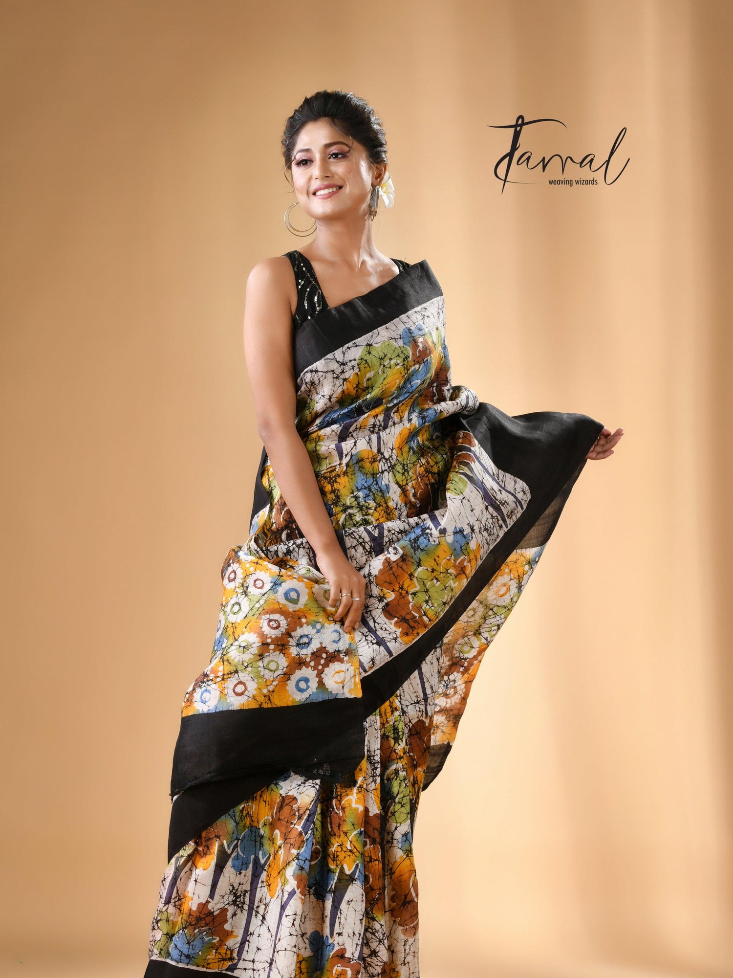 Offwhite with black border handcrafted batik pure silk saree