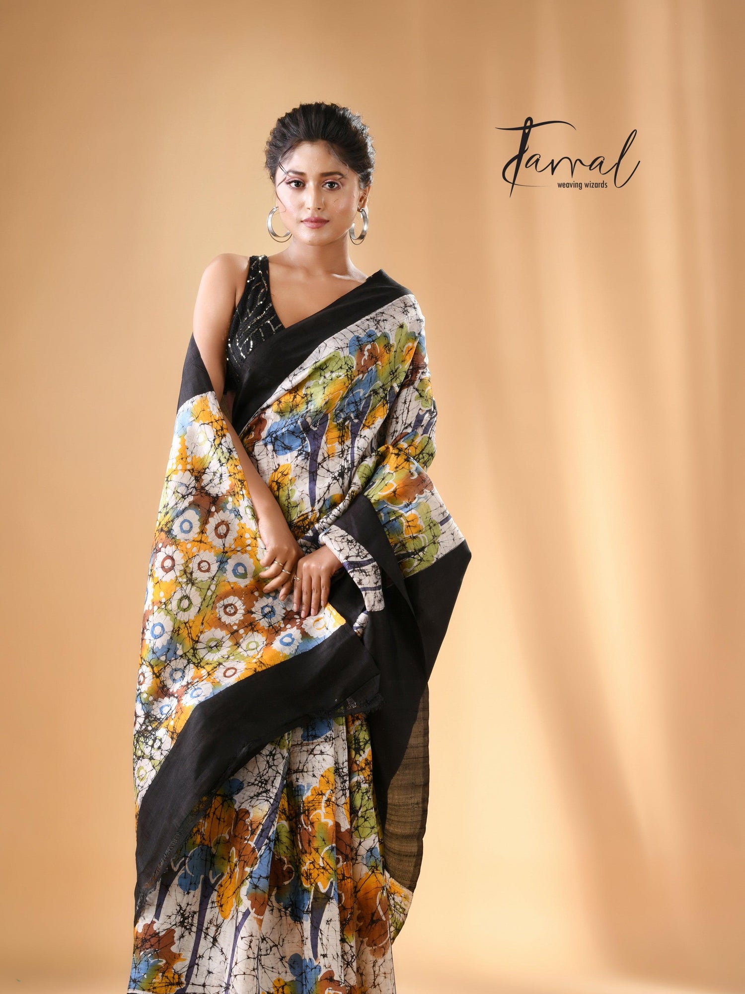 Offwhite with black border handcrafted batik pure silk saree