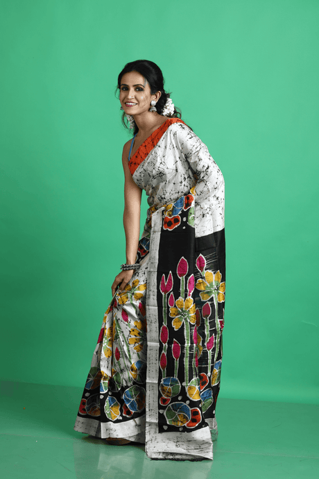 Offwhite with multicolor lotus handcrafted batik silk saree