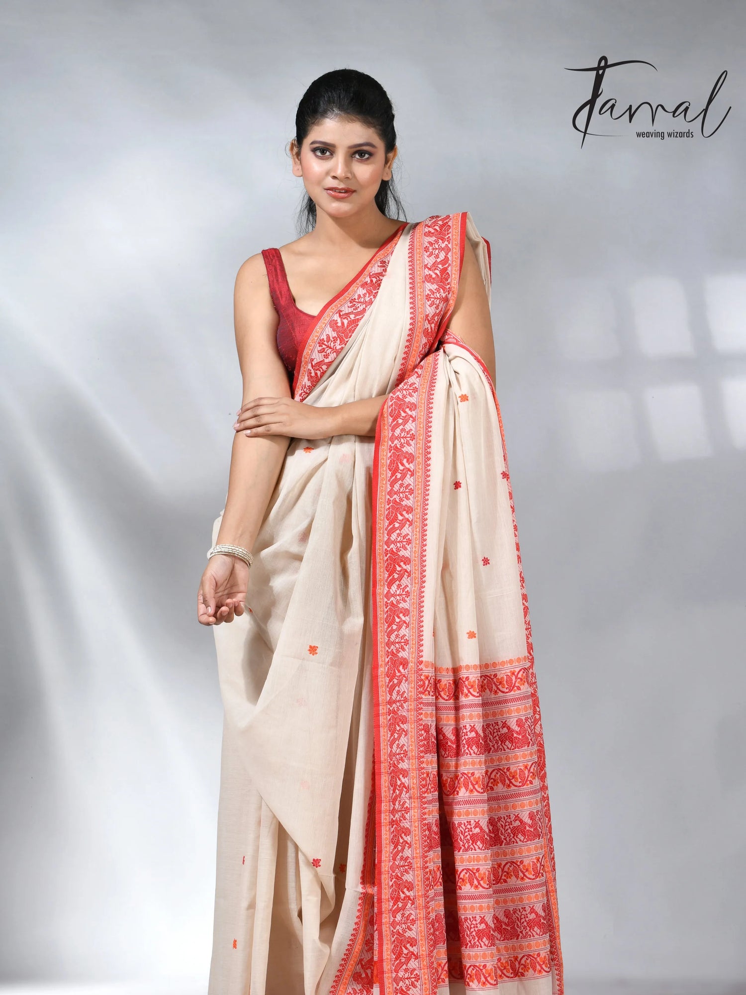 Offwhite with orange pure cotton baluchuri handloom saree