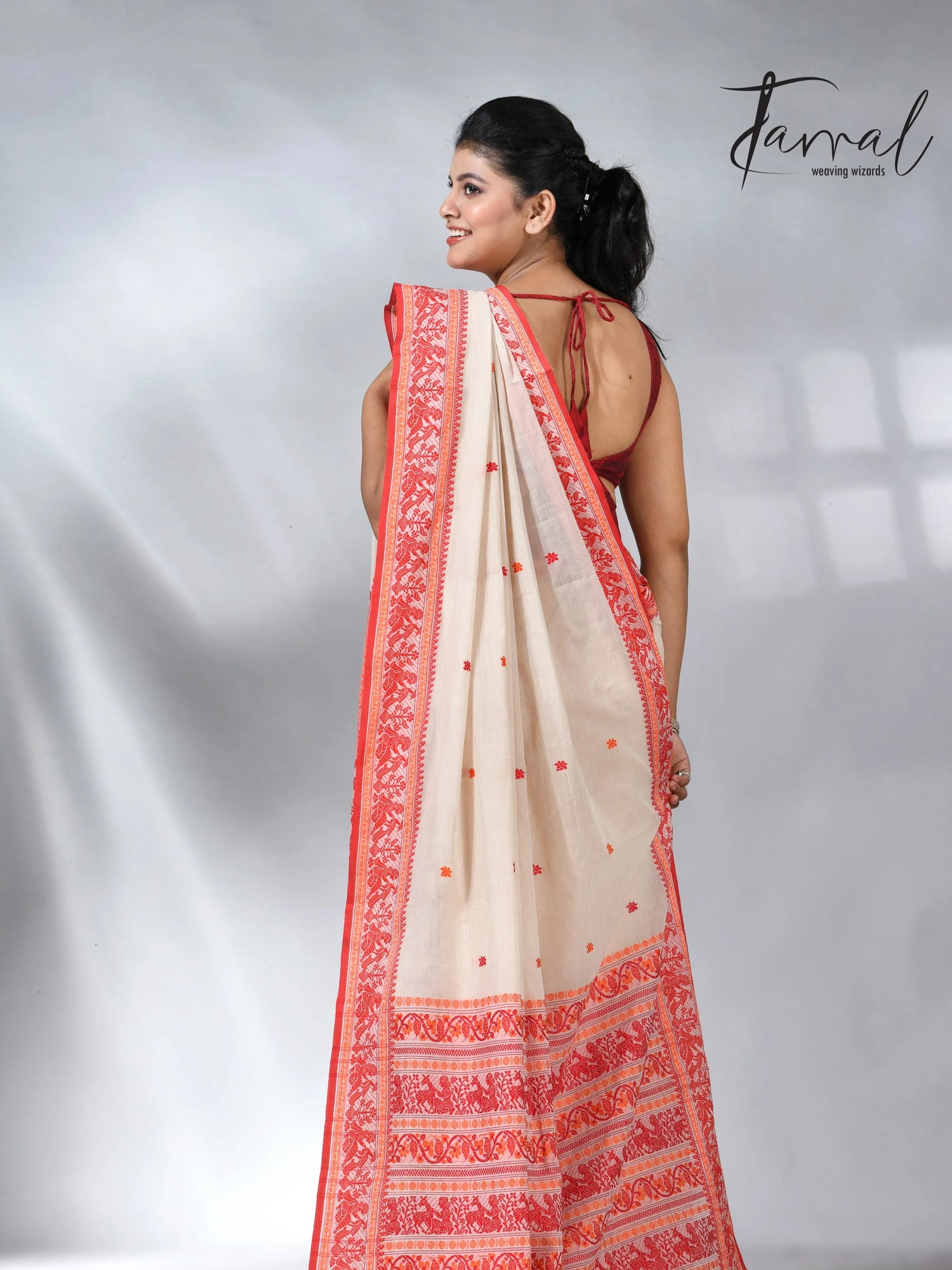 Offwhite with orange pure cotton baluchuri handloom saree