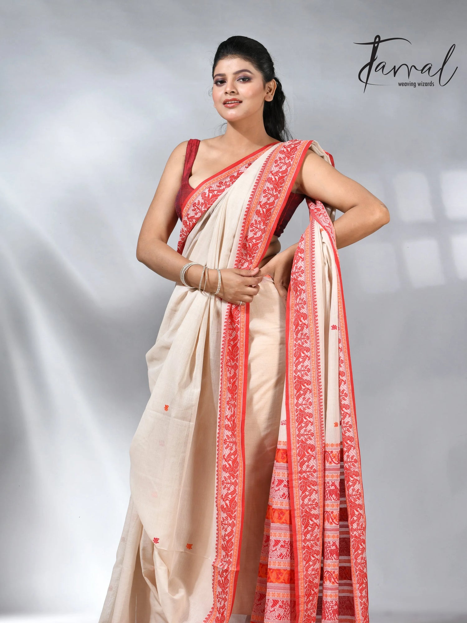 Offwhite with orange pure cotton baluchuri handloom saree