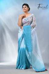 Offwhite with sky blue color pure linen hand embroidery saree