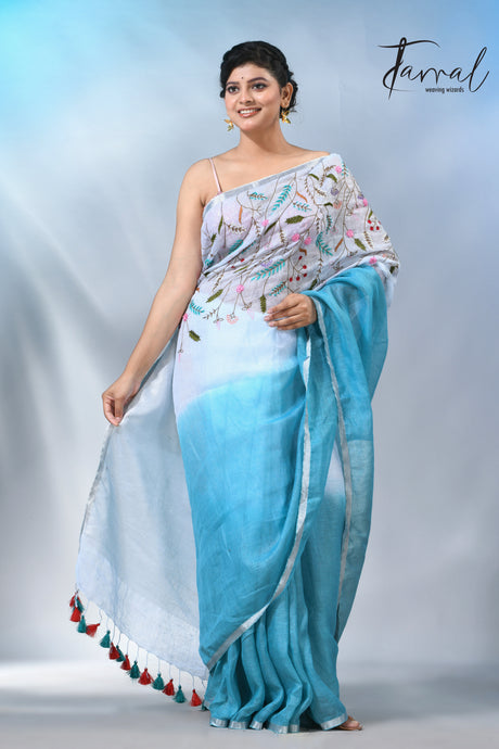 Offwhite with sky blue color pure linen hand embroidery saree