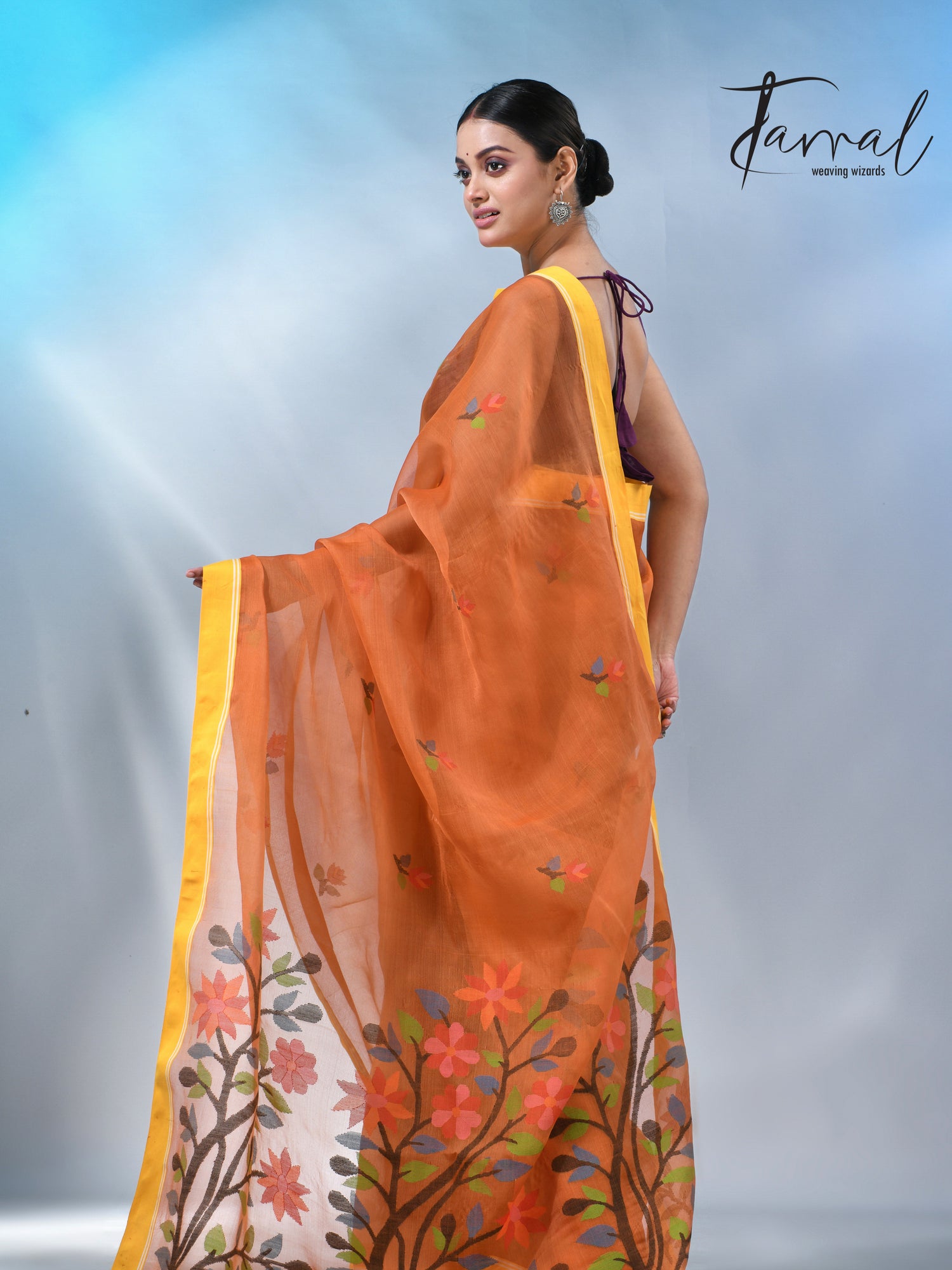 Orange colour muslin silk floral handwoven jamdani saree