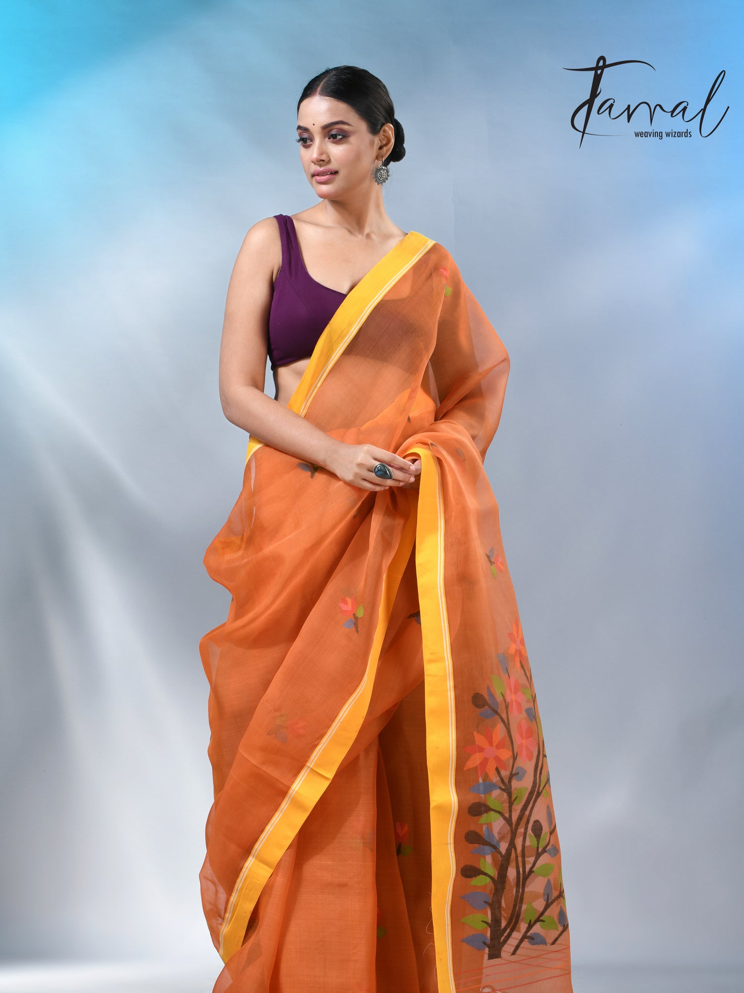 Orange colour muslin silk floral handwoven jamdani saree