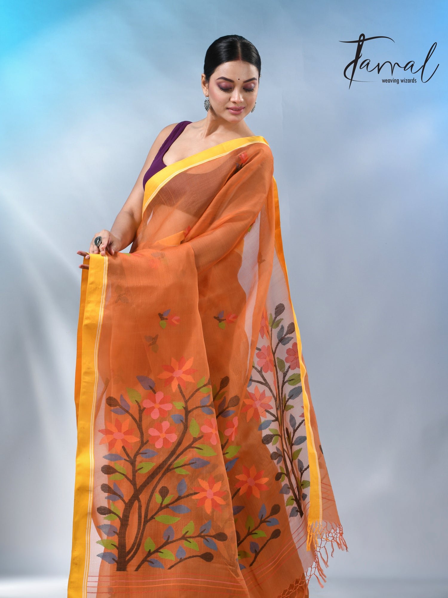 Orange colour muslin silk floral handwoven jamdani saree
