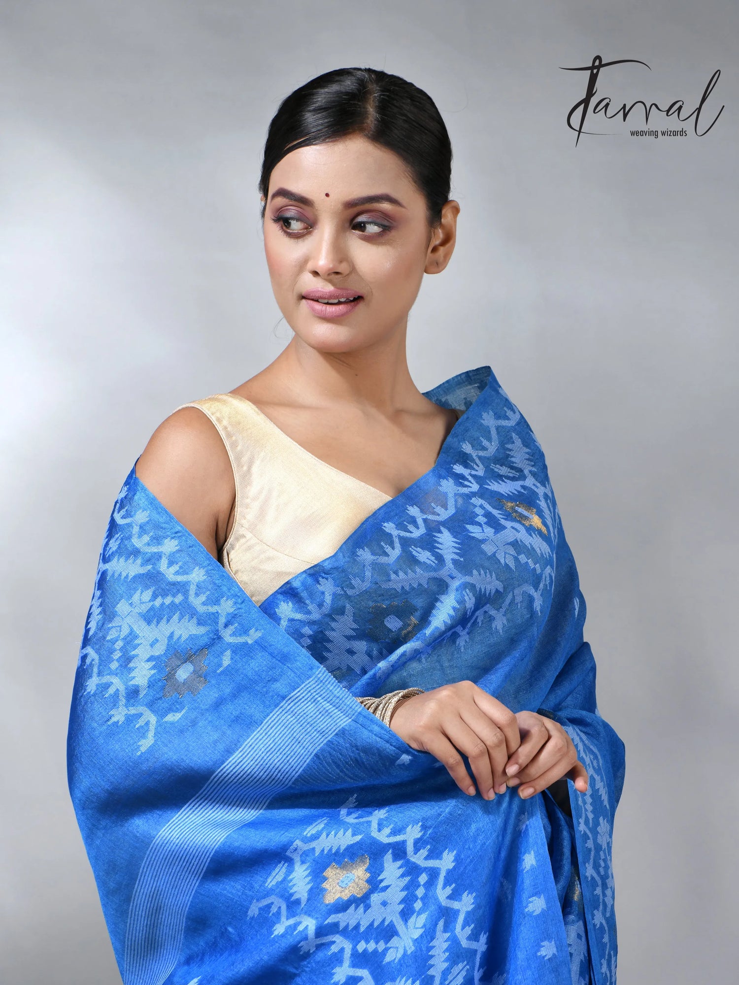 Peacock blue and white Dhakai tusser handwoven jamdani saree