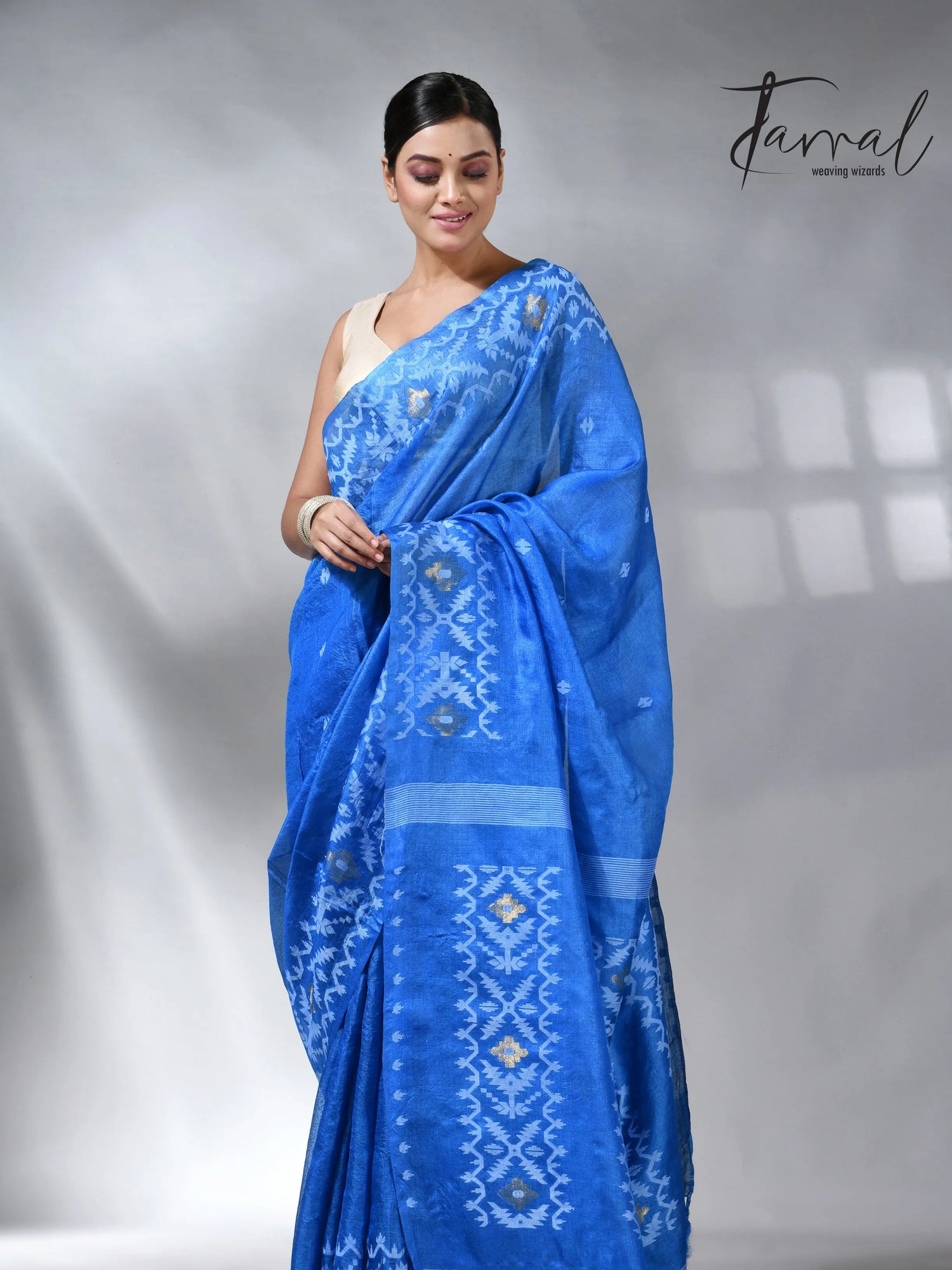 Peacock blue and white Dhakai tusser handwoven jamdani saree