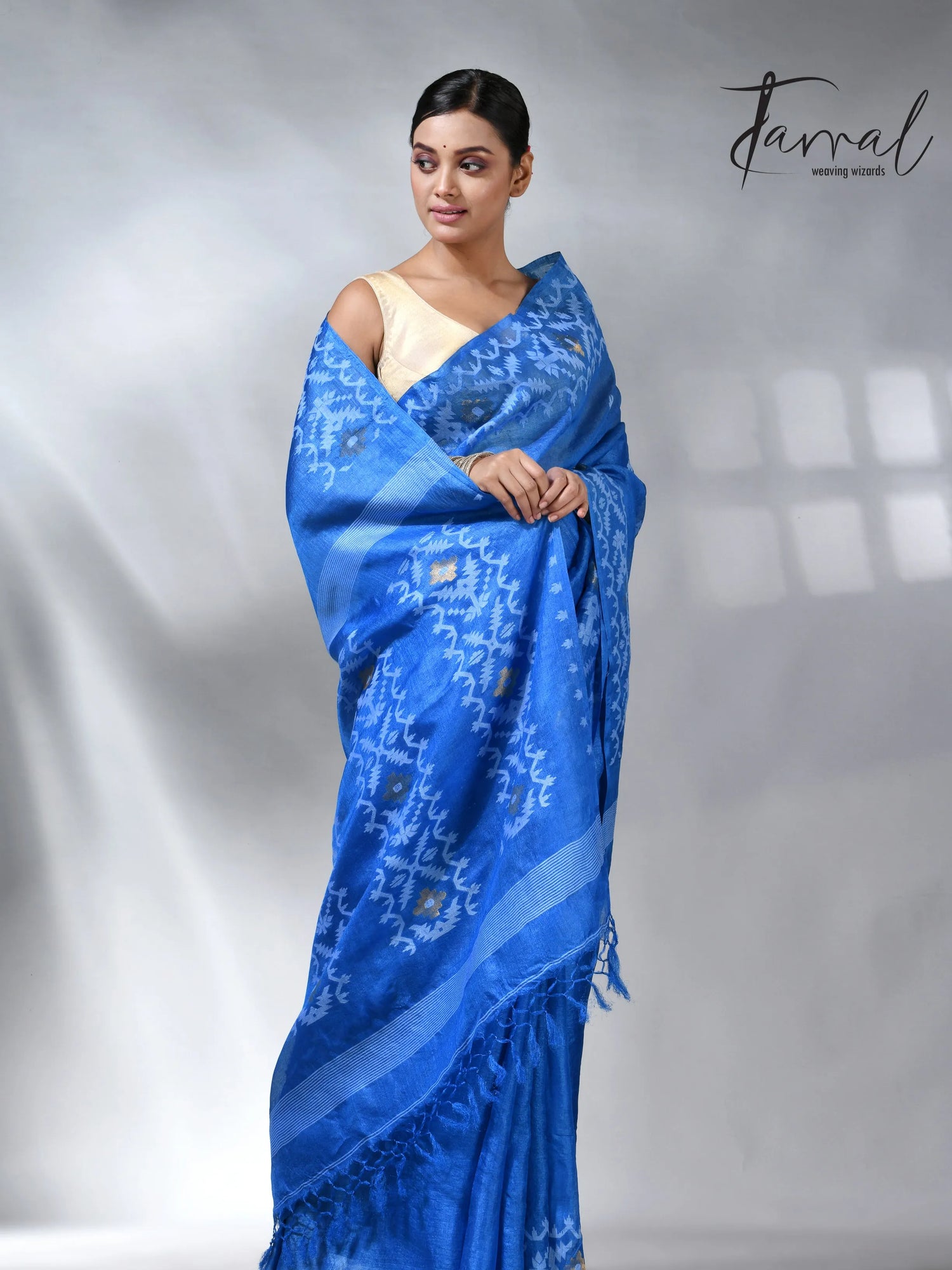Peacock blue and white Dhakai tusser handwoven jamdani saree
