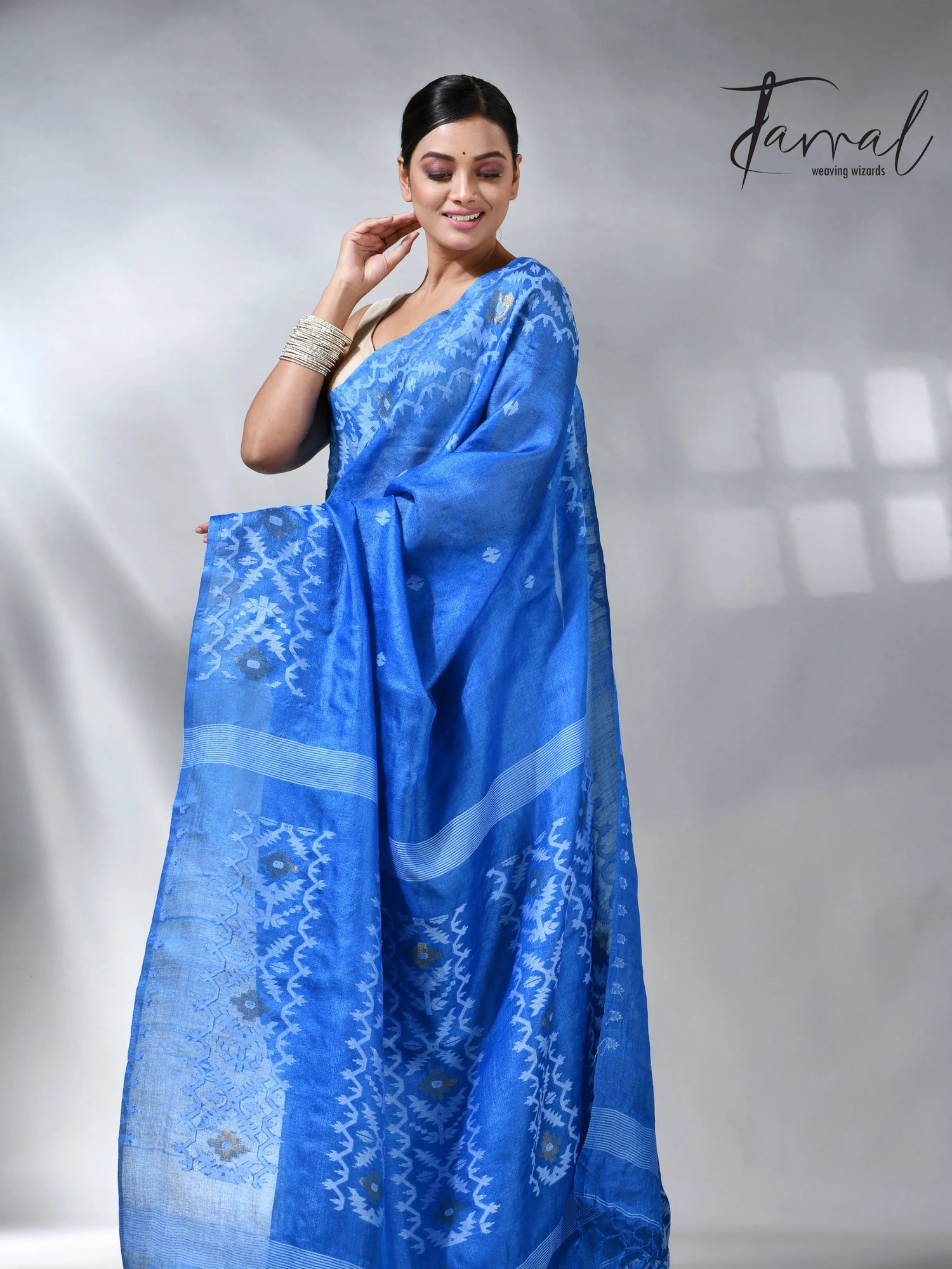 Peacock blue and white Dhakai tusser handwoven jamdani saree