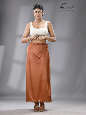 LIGHT ORANGE LYCRA STRETCHABLE PETTICOAT - Tamal Boutique