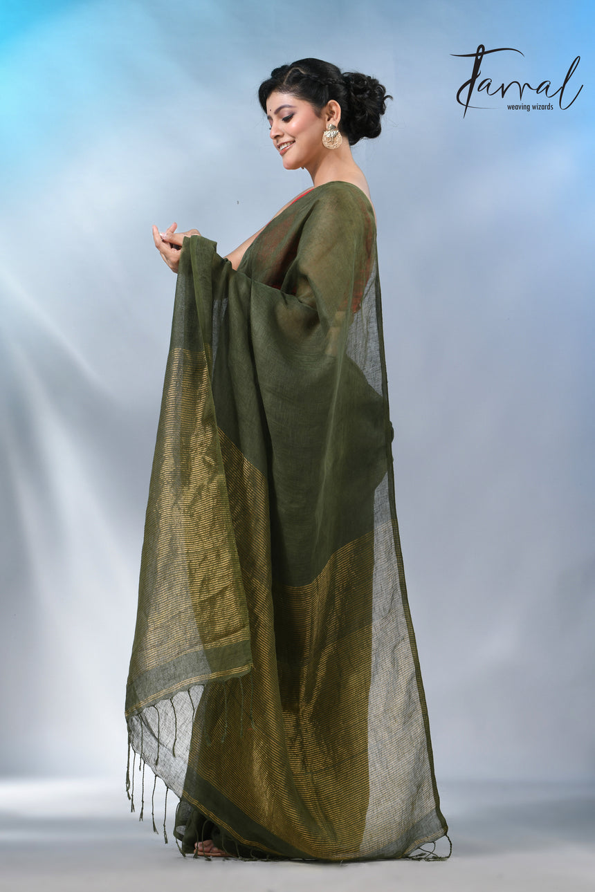 Bottle green with golden zari stripe pallu linen handloom saree