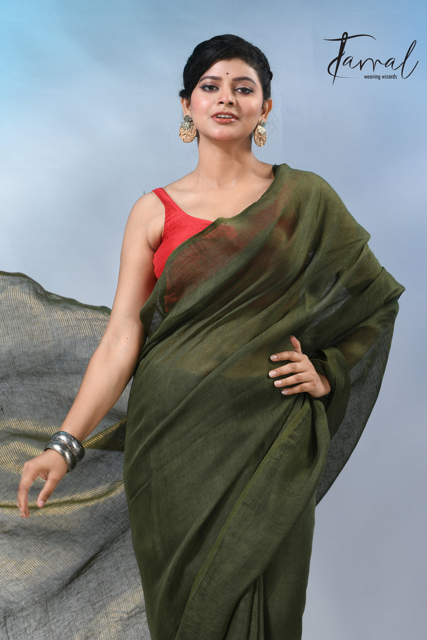 Bottle green with golden zari stripe pallu linen handloom saree