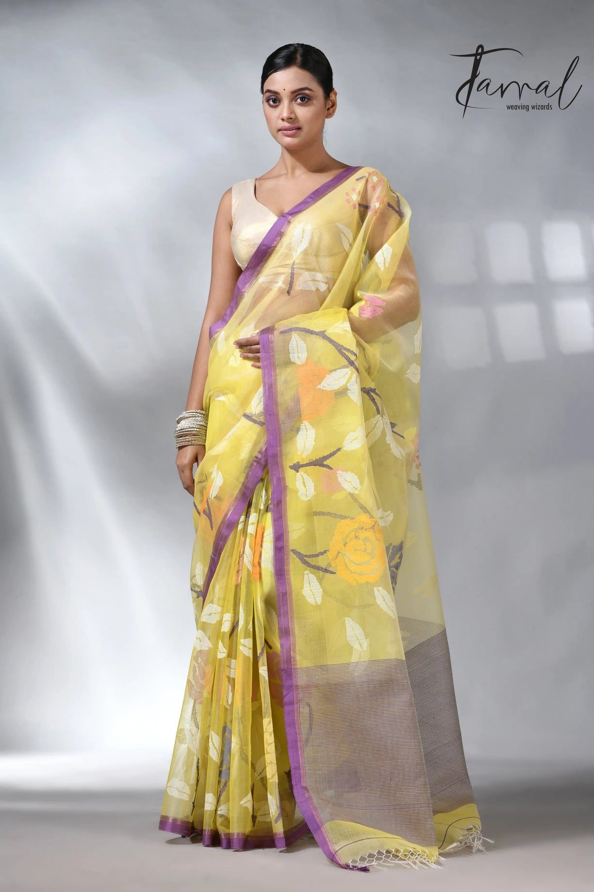 Yellow with purple border allover rose motifs handwoven musli silk jamdani saree
