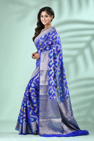 Royal Blue Banarasi Silk Saree with Antique Silver Zari Jal Weave, featuring intricate patterns and a graceful drape.