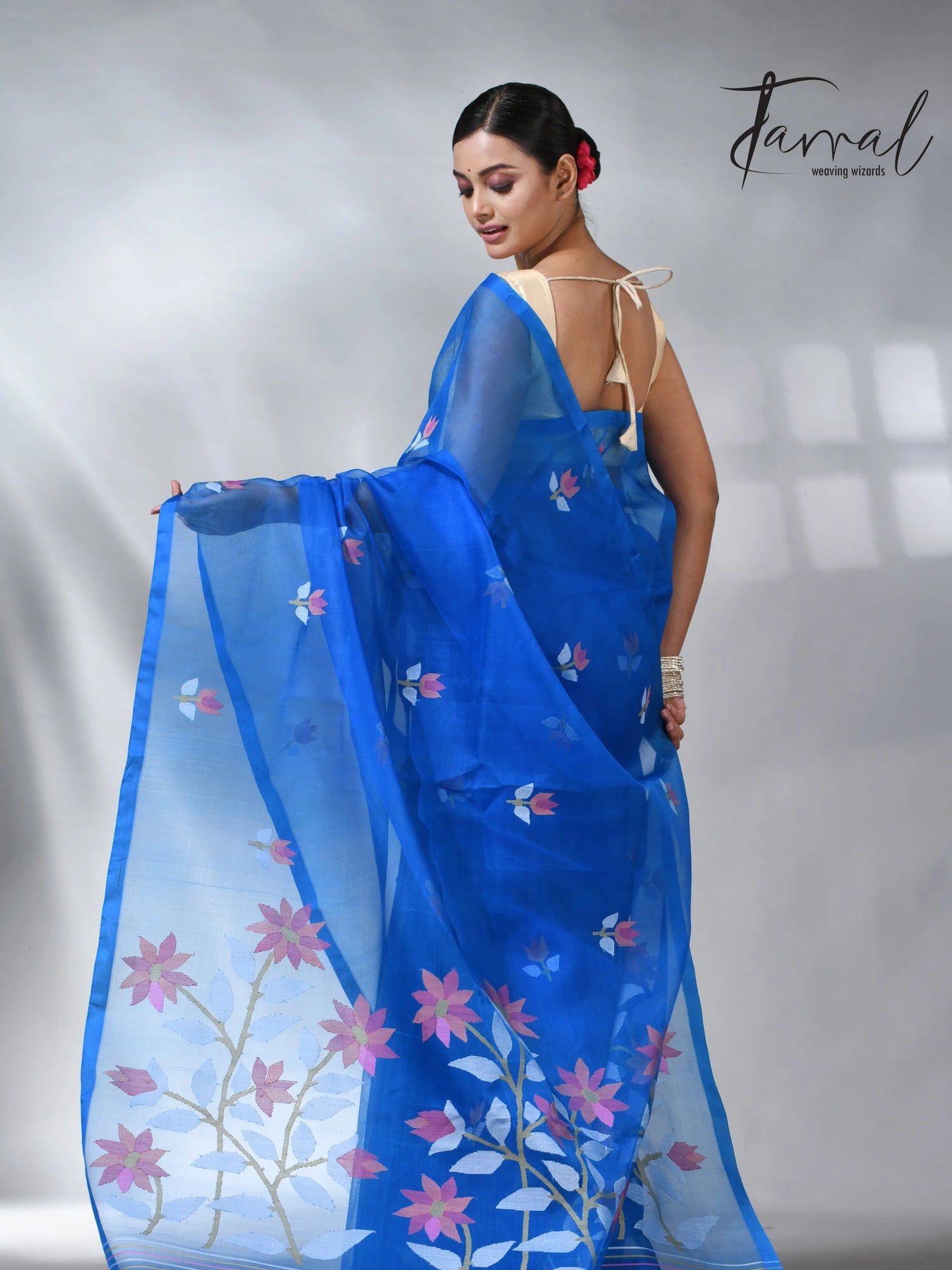 Sea blue colour in floral muslin silk handwoven jamdani saree