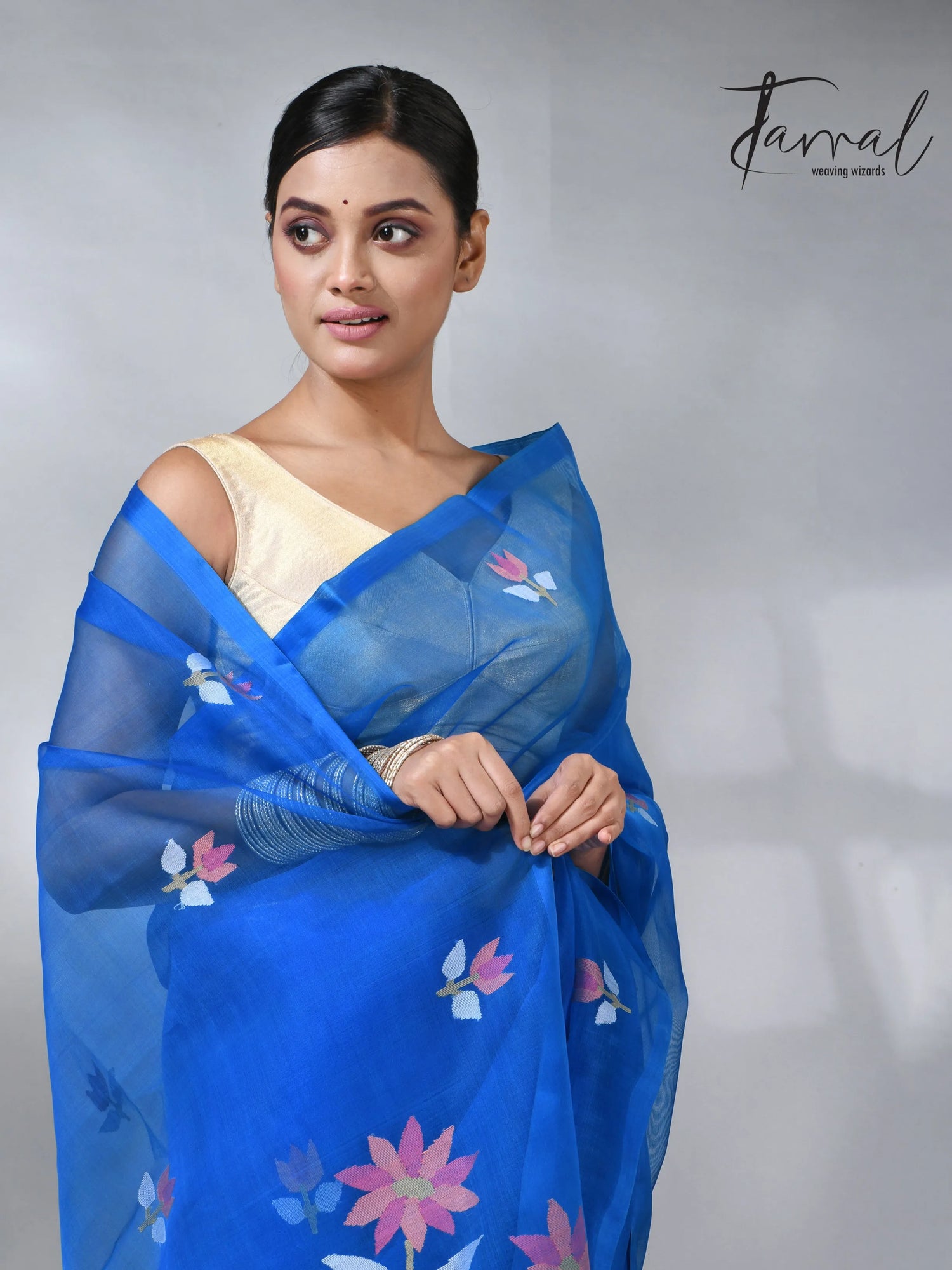 Sea blue colour in floral muslin silk handwoven jamdani saree
